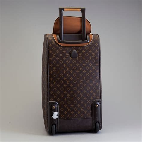 louis vuitton trolley prezzi|louis vuitton wheeled carry on.